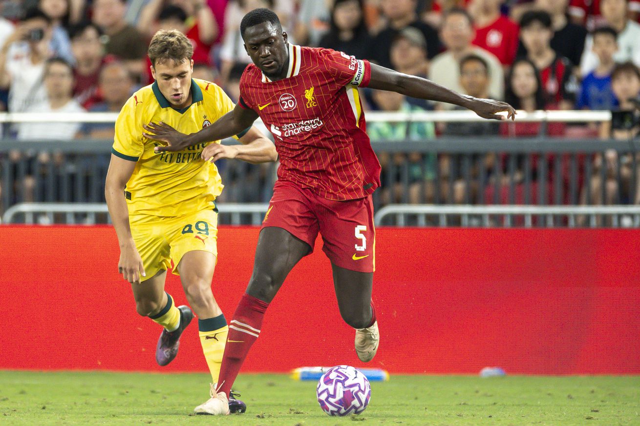 Ibrahima Konate of Liverpool (R) and Vittorio Magni of AC Milan (L) competes with the ball during the Liverpool FC v AC Milan Pre-Season Friendly match at Kai Tak Stadium on July 26, 2025 in Hong Kong, China.